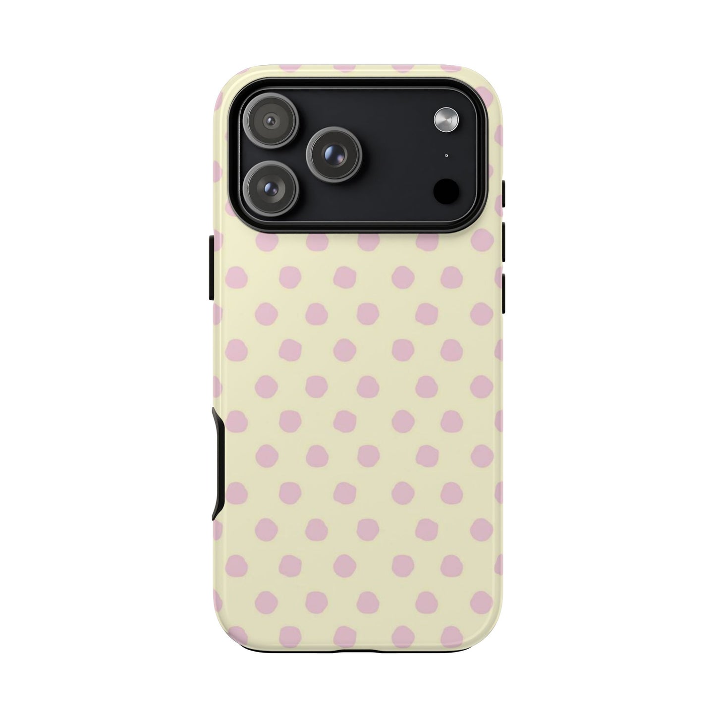 Phone case with pink polka dots on a beige background